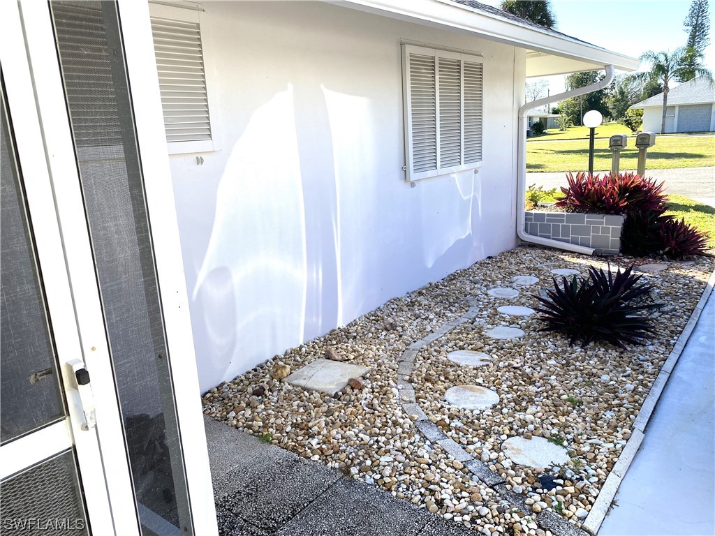 347 Richland Road Lehigh Acres, FL 33936 - Photo 3 of 26 a view of a porch
