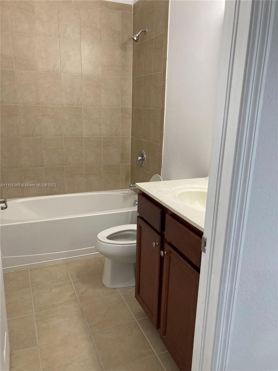 The Hammocks Miami, FL 33196 - Photo 23 of 27 a bathroom with a sink a toilet and shower