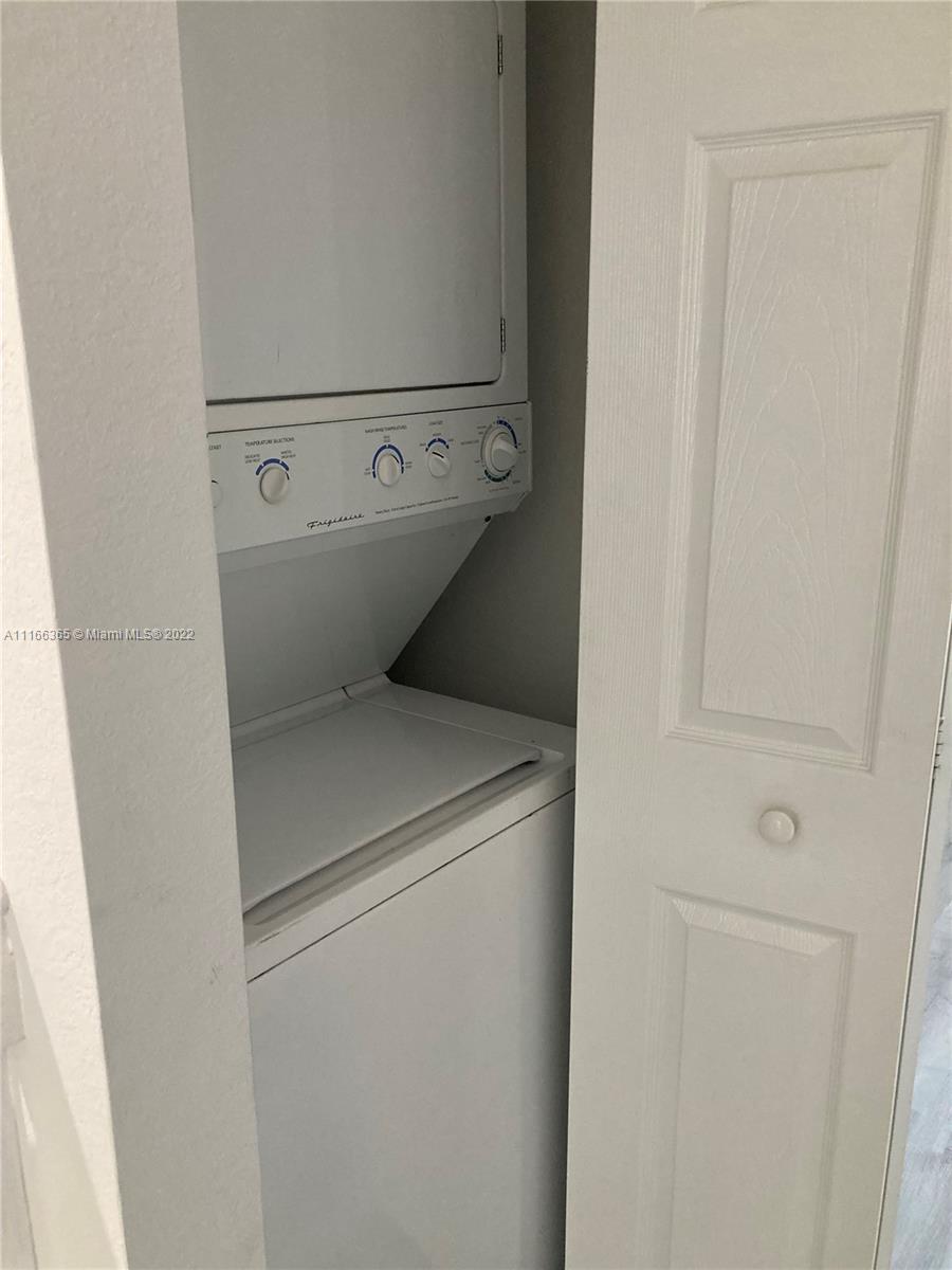 The Hammocks Miami, FL 33196 - Photo 25 of 27 a utility room with dryer and washer