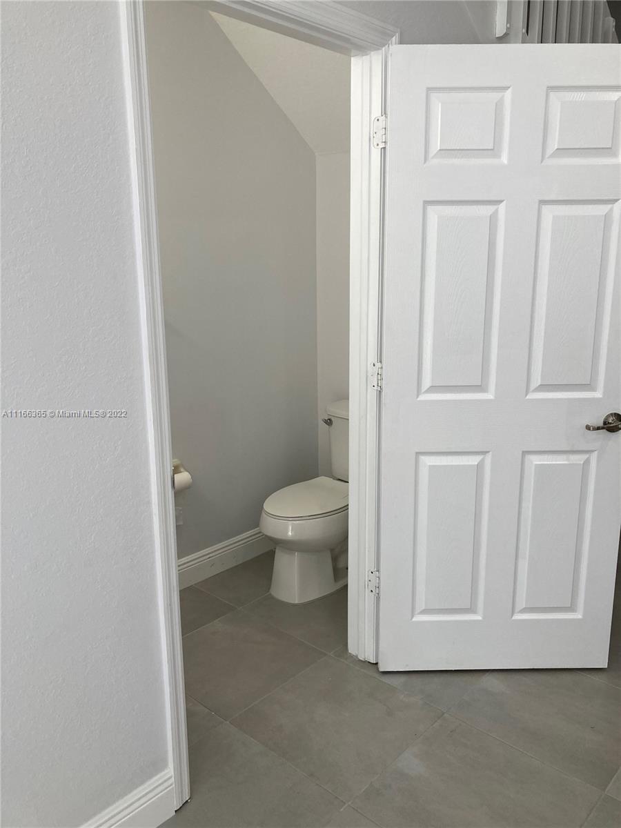 The Hammocks Miami, FL 33196 - Photo 27 of 27 a bathroom with a toilet