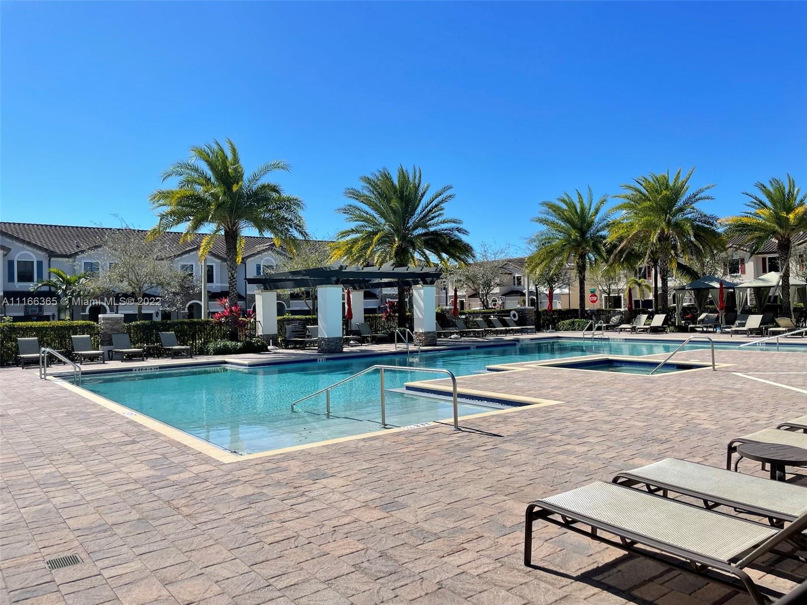 The Hammocks Miami, FL 33196 - Photo 3 of 27 a view of a swimming pool with lounge chair