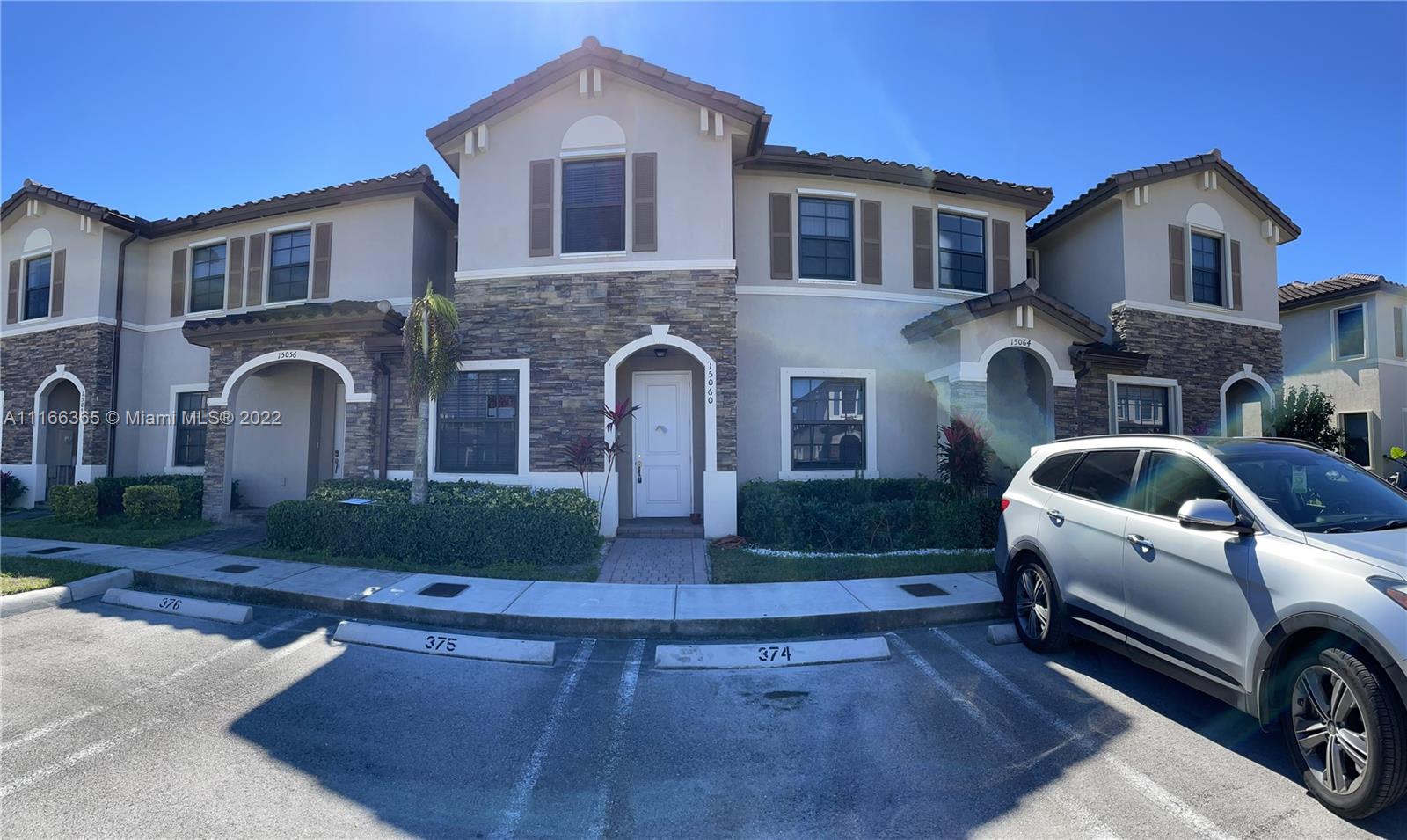 The Hammocks Miami, FL 33196 - Photo 4 of 27 a front view of a house with a yard