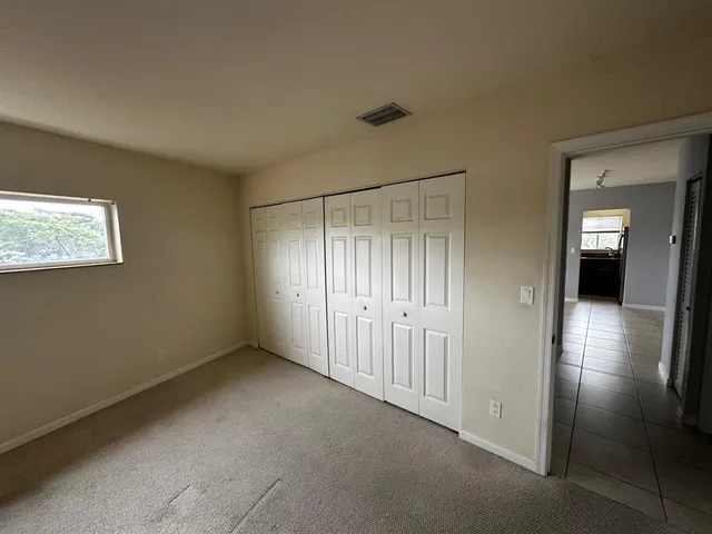 a view of hallway with livingroom