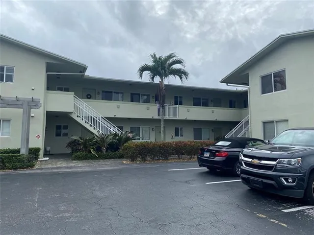 a car parked in front of a building