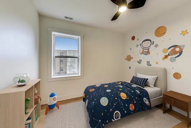 a bedroom with a bed and a window