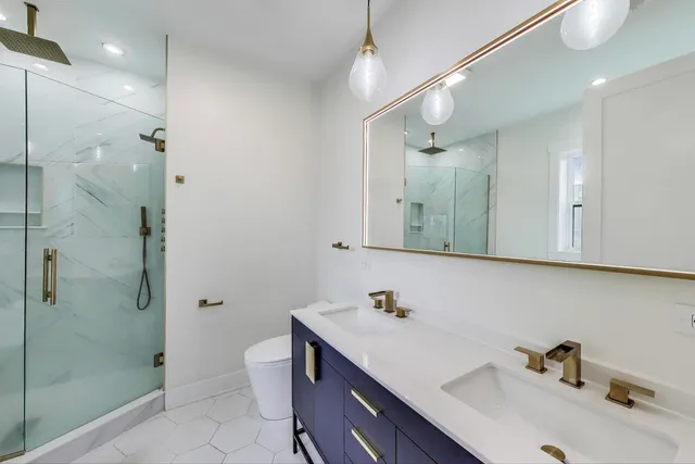 a bathroom with a sink and mirror