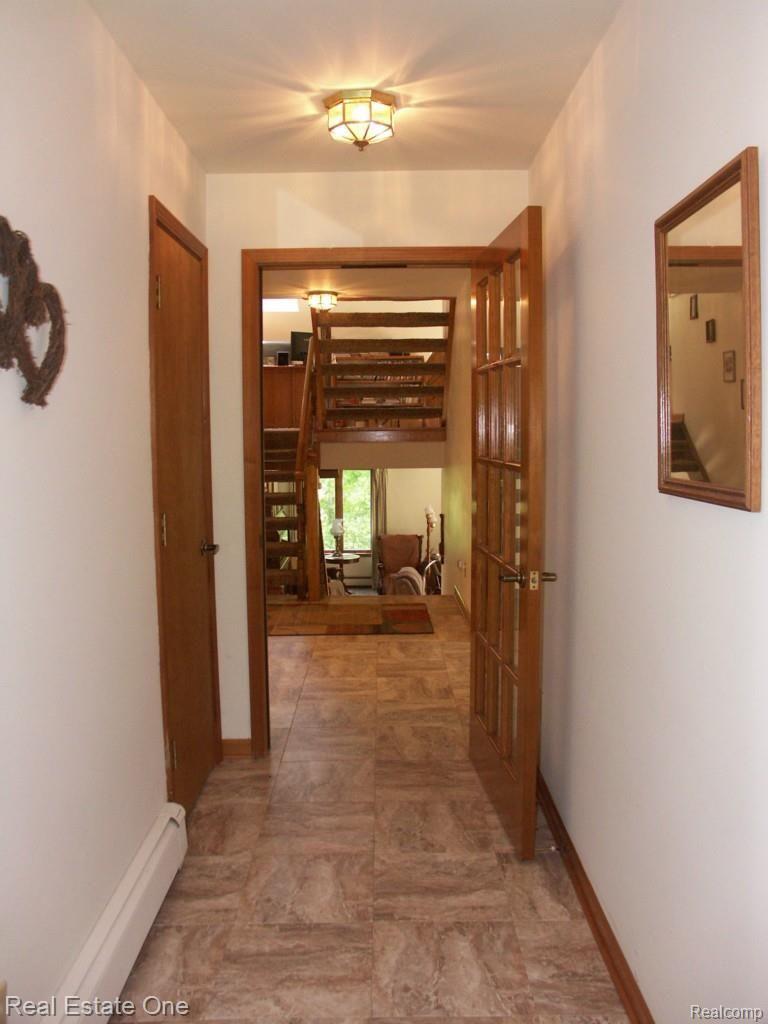 1470 Ranch Road Holly, MI 48442 - Photo 18 of 63 Large foyer with french style door