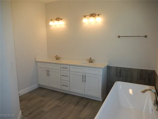 a bathroom with a sink and a vanity