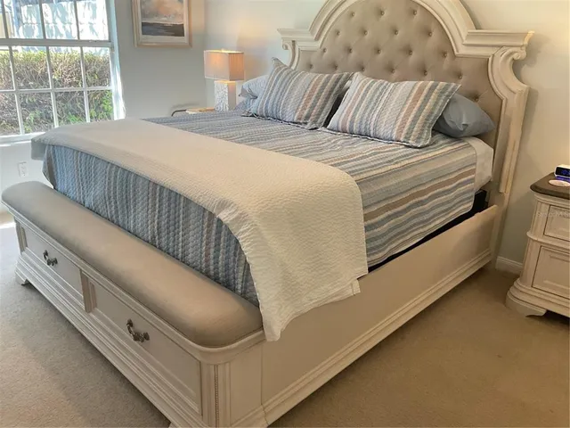 a bathroom with a double vanity sink and mirror