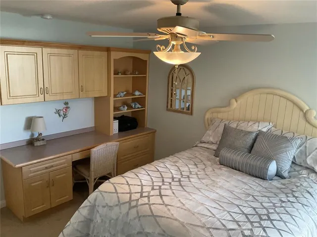 a view of a closet area with living room