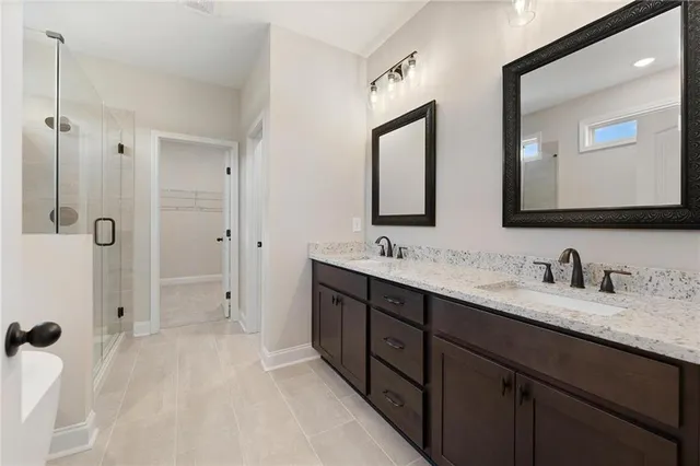a bathroom with sink and mirror