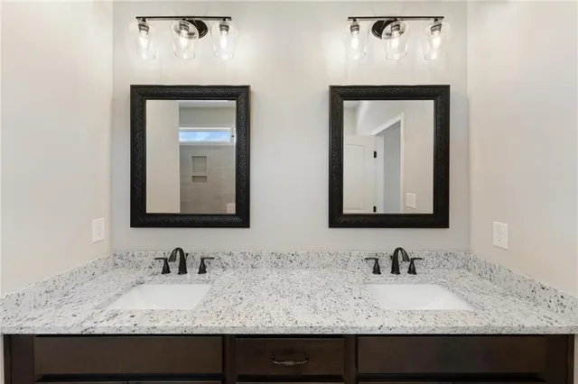 a white bath tub sitting next to a shower