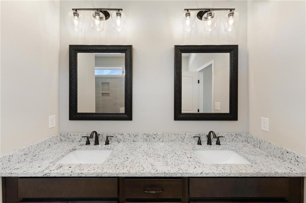 280 Camden Loop Jefferson, GA 30549 - Photo 20 of 43 a bathroom with sink and mirror