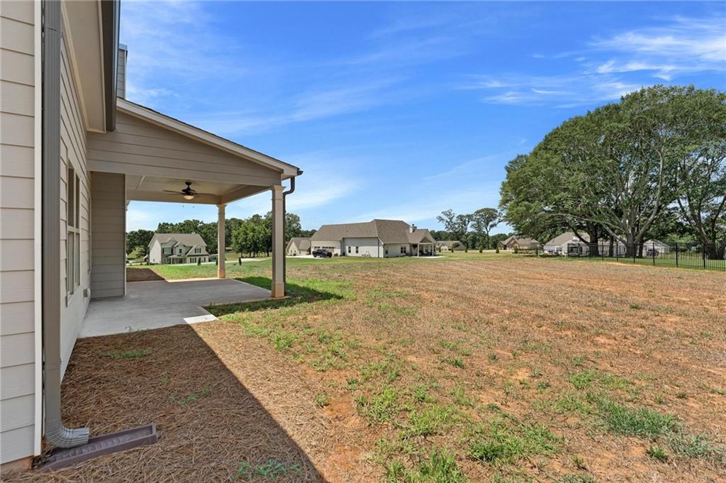 280 Camden Loop Jefferson, GA 30549 - Photo 39 of 43 a view of a patio and yard