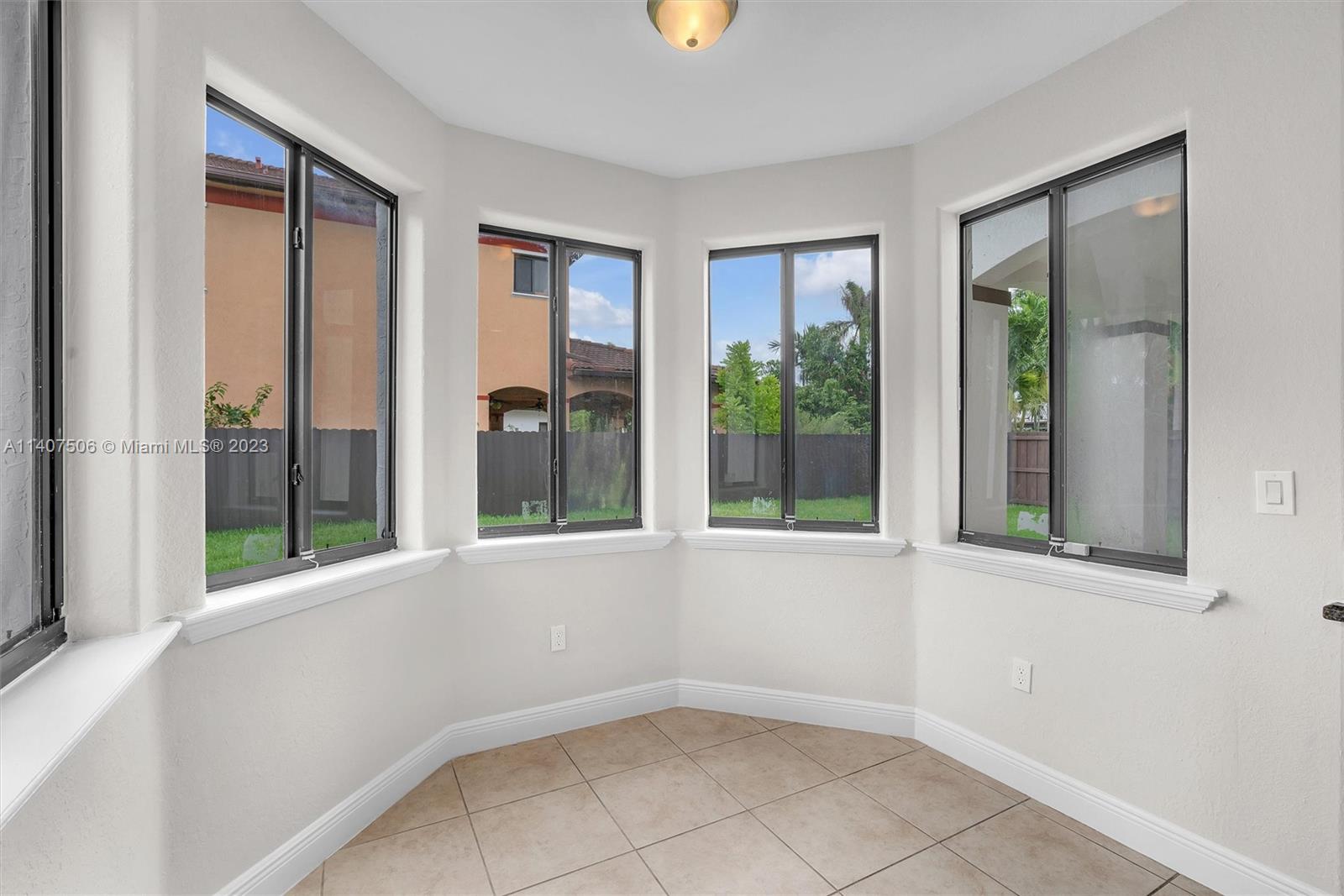 Tamiami Miami, FL 33184 - Photo 17 of 46 an empty room with windows