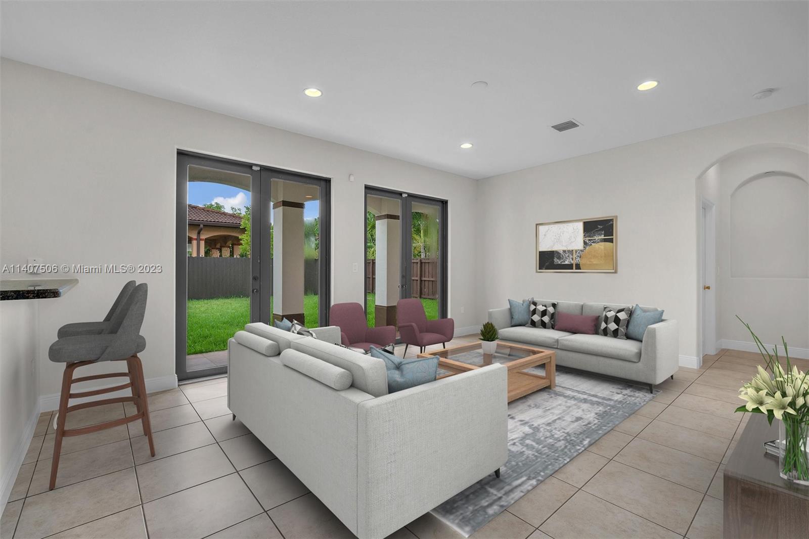 Tamiami Miami, FL 33184 - Photo 19 of 46 a living room with furniture and windows