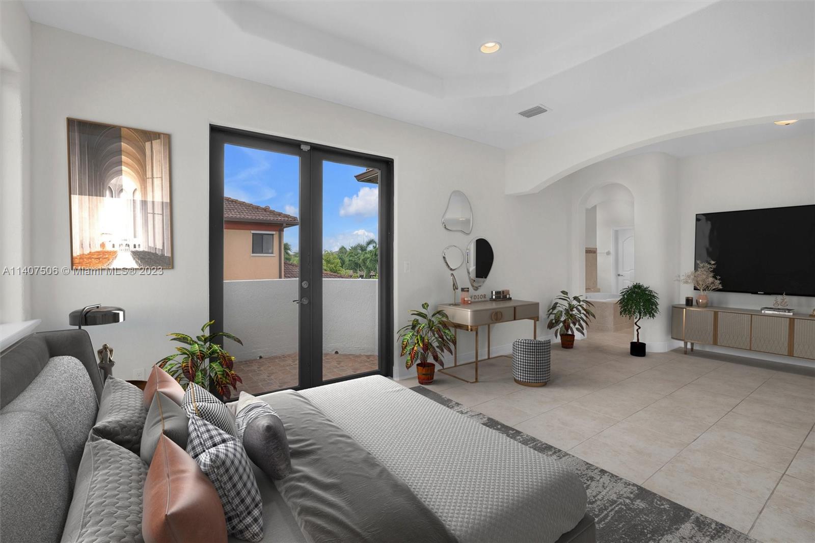 Tamiami Miami, FL 33184 - Photo 24 of 46 a living room with furniture and a flat screen tv