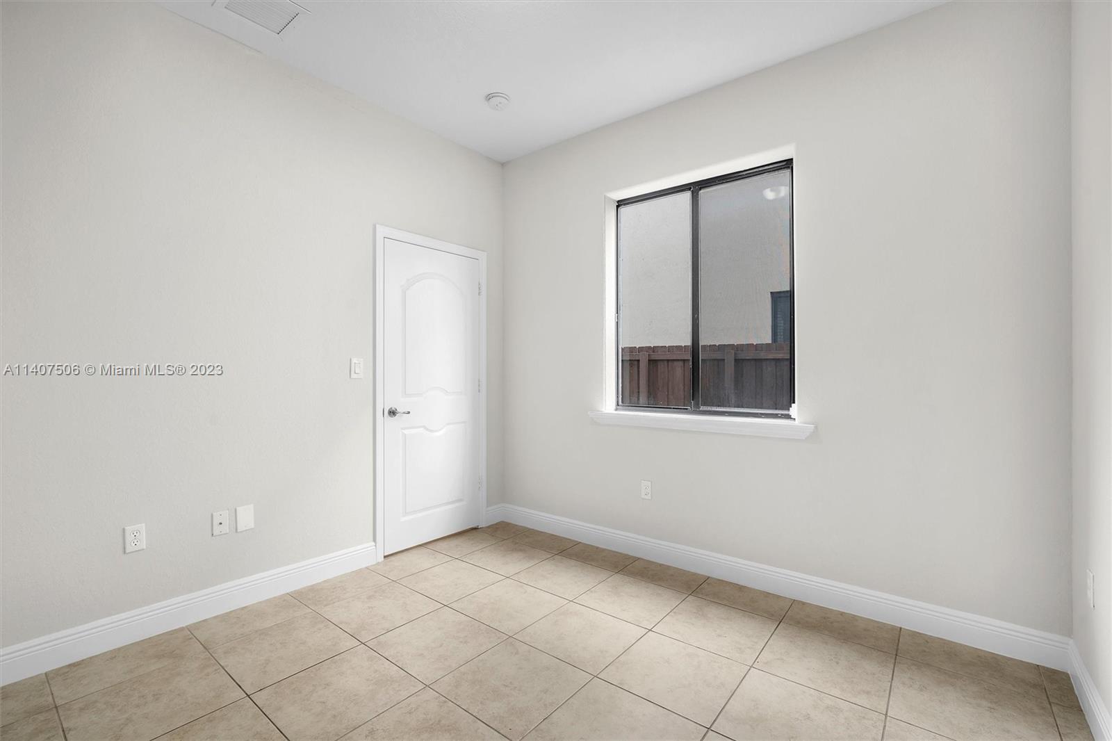 Tamiami Miami, FL 33184 - Photo 35 of 46 a view of an empty room with window