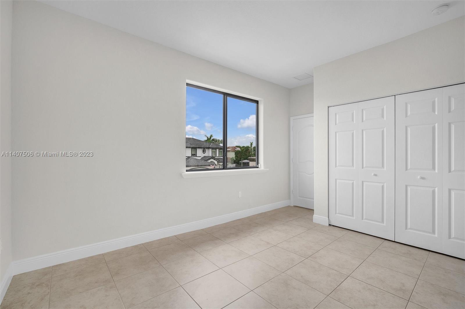 Tamiami Miami, FL 33184 - Photo 38 of 46 an empty room with windows