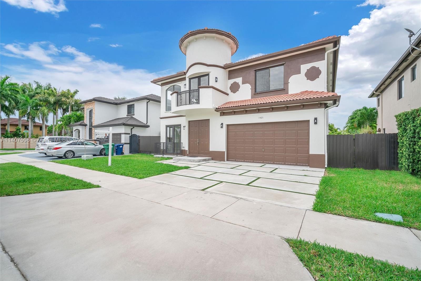 Tamiami Miami, FL 33184 - Photo 4 of 46 a front view of a house with garden