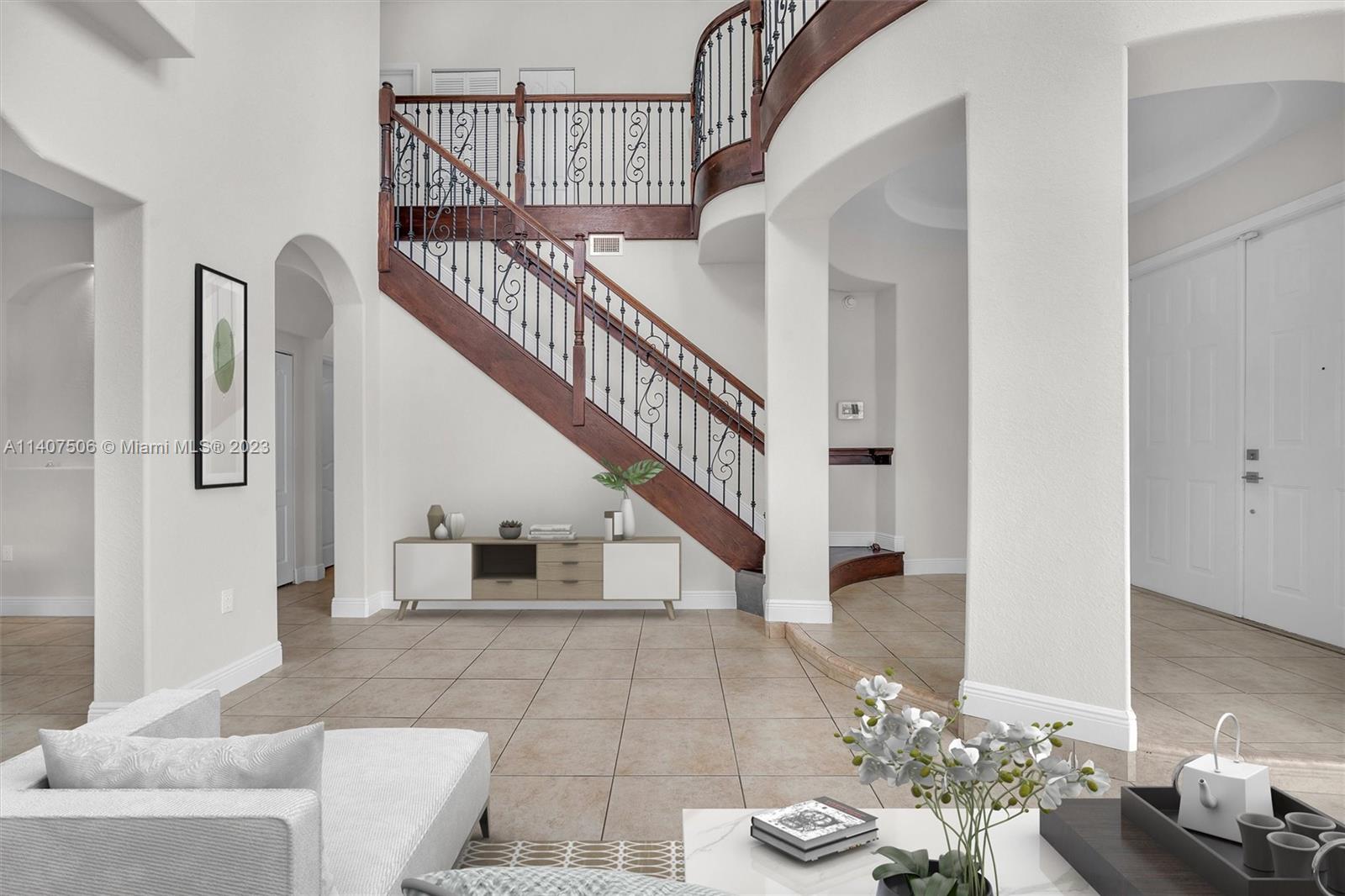 Tamiami Miami, FL 33184 - Photo 7 of 46 a view of entryway and hall with wooden floor