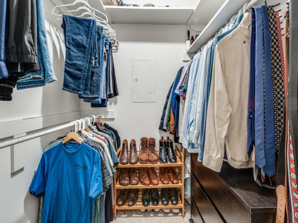 5200 Martel Avenue, Unit 6Q Dallas, TX 75206 - Photo 19 of 32 a view of walk in closet with clothes and shoes