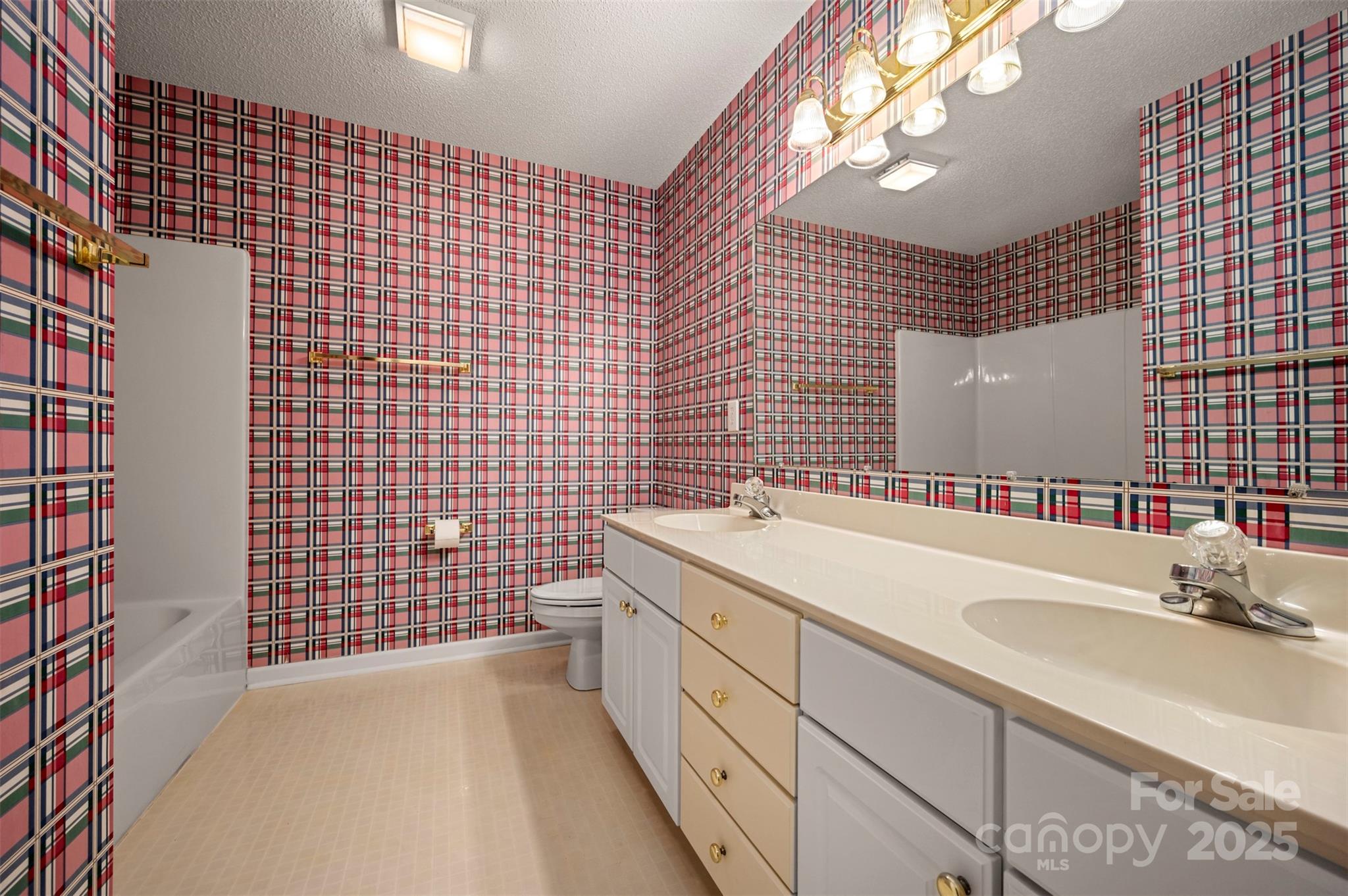 506 Pleasant Street Spindale, NC 28160 - Photo 21 of 34 a bathroom with a sink a vanity granite and a shower