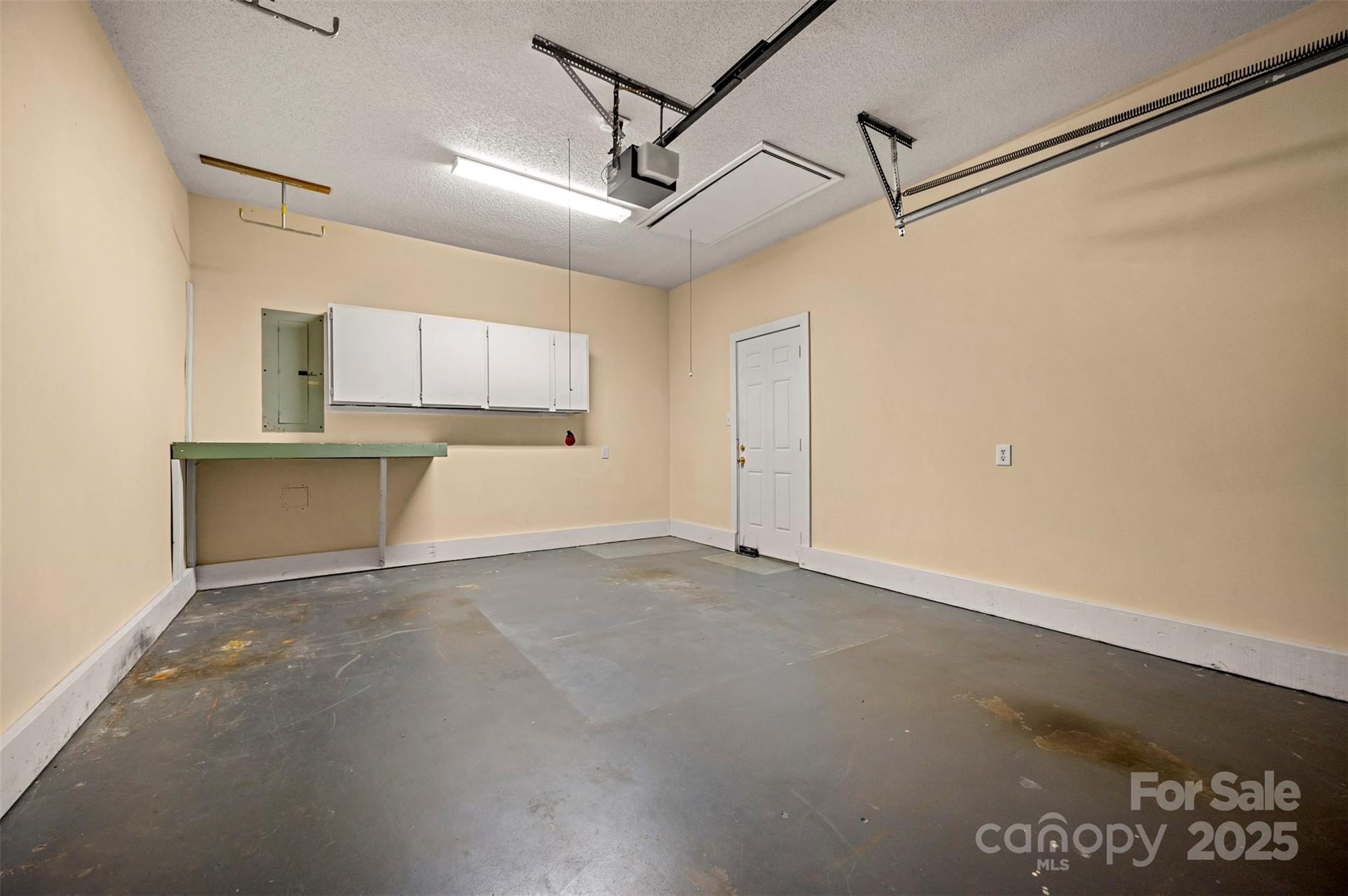 506 Pleasant Street Spindale, NC 28160 - Photo 24 of 34 a view of a kitchen with a sink and a refrigerator