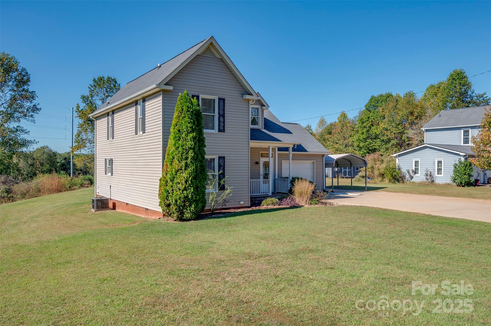 506 Pleasant Street Spindale, NC 28160 - Photo 29 of 34 a view of a house with a yard and garage