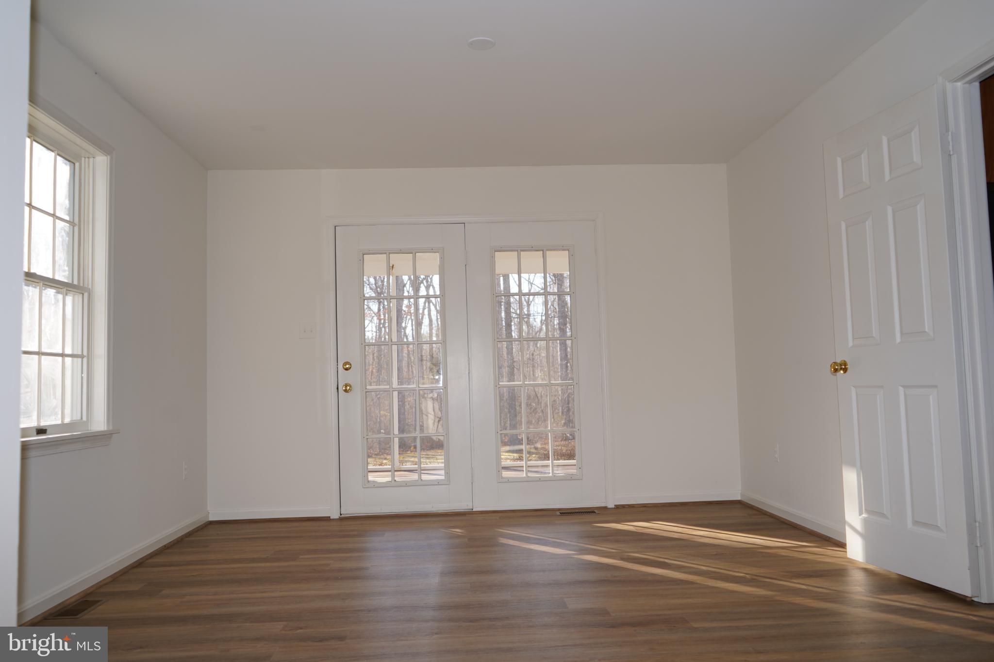 7323 O'Keefe Road Bealeton, VA 22712 - Photo 7 of 48 Dining Room with double doors out to covered porch