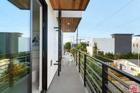 a picture of a city view from a balcony