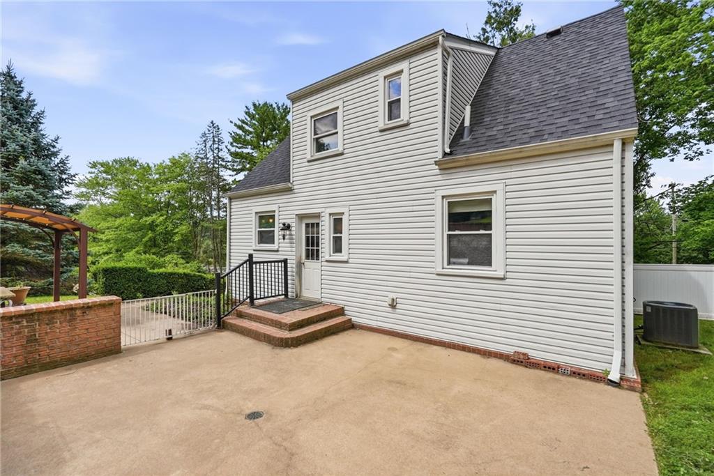 809 Franklin Road Mars, PA 16046 - Photo 32 of 44 Rear exterior with patio and mature trees