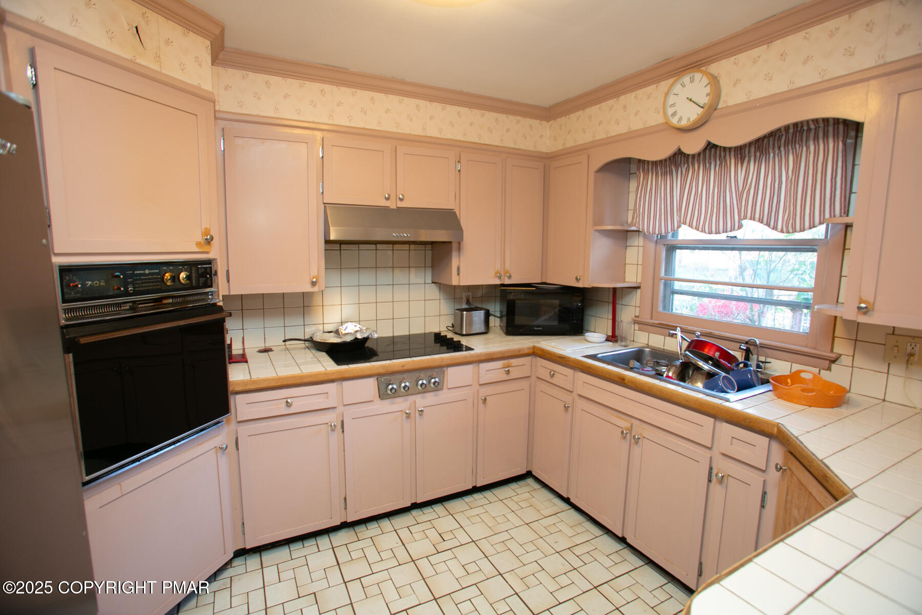 202 Norton Road Stroudsburg, PA 18360 - Photo 15 of 35 a kitchen with a sink cabinets and window