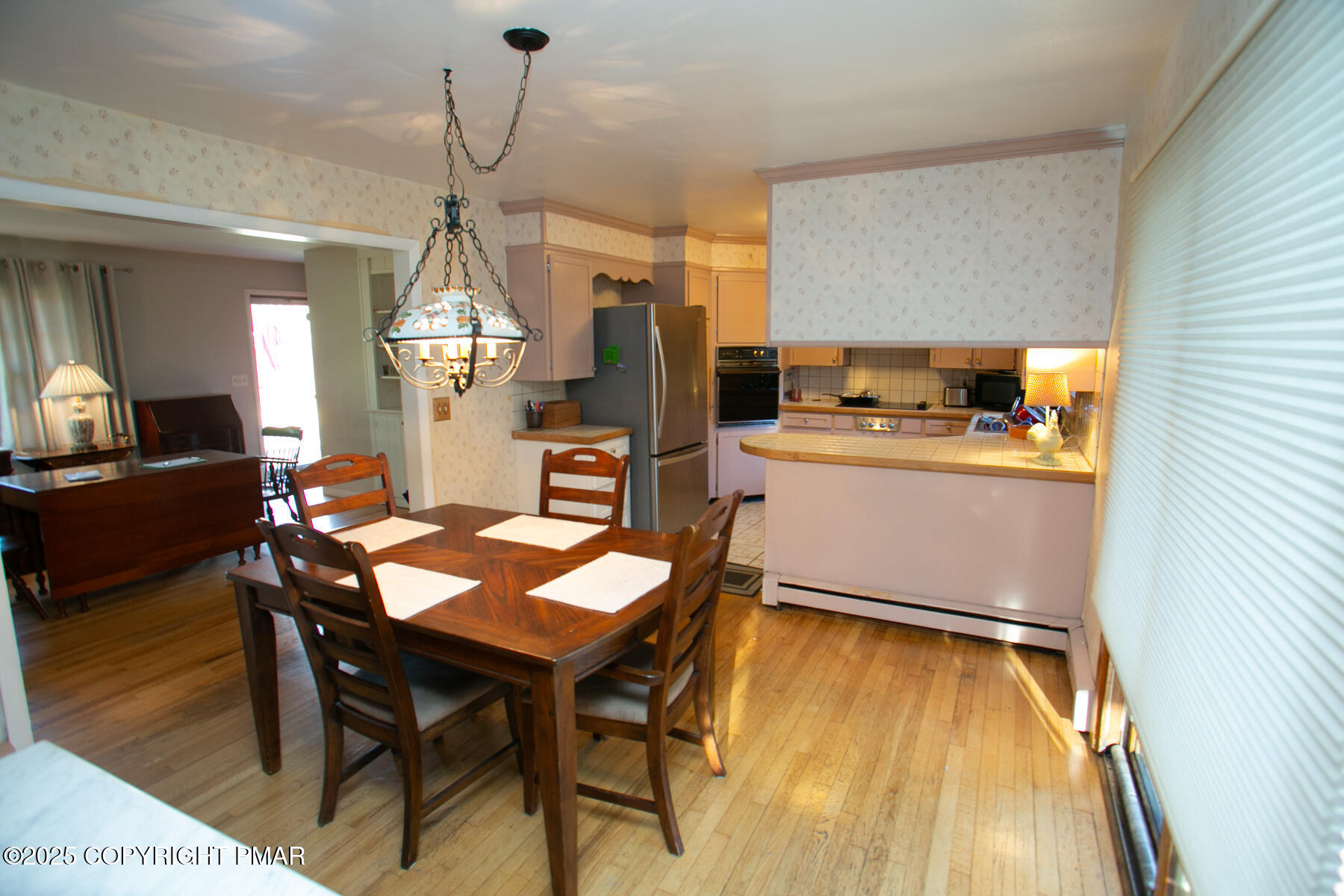 202 Norton Road Stroudsburg, PA 18360 - Photo 17 of 35 a room with stainless steel appliances kitchen island a table and chairs in it