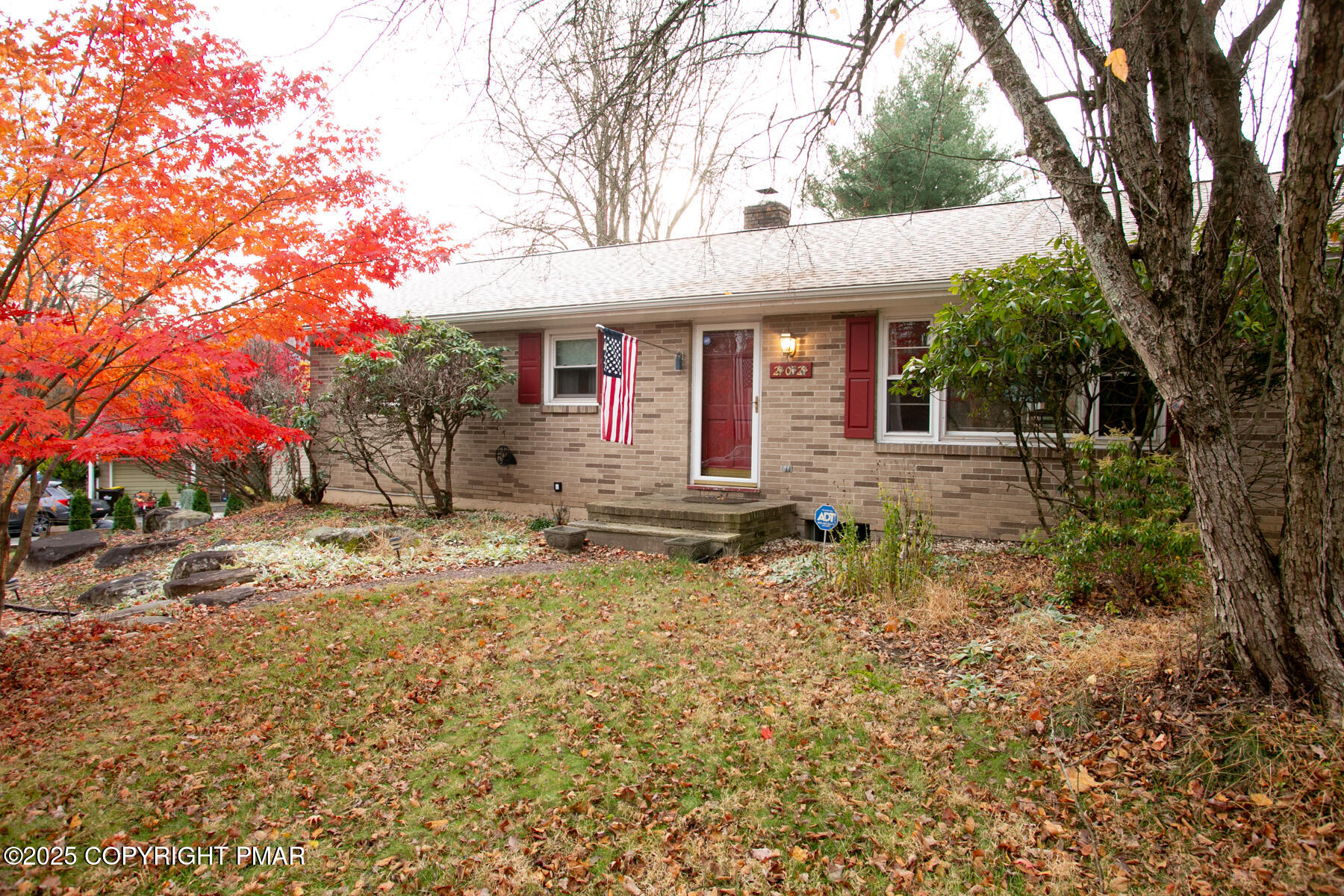 202 Norton Road Stroudsburg, PA 18360 - Photo 2 of 35 a front view of a house with garden