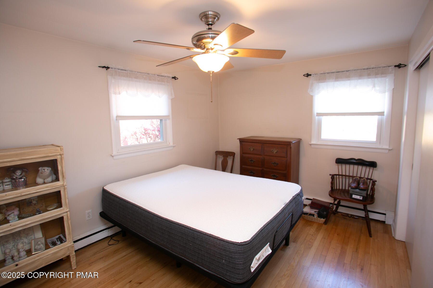 202 Norton Road Stroudsburg, PA 18360 - Photo 22 of 35 a bed sitting in a bedroom next to a window