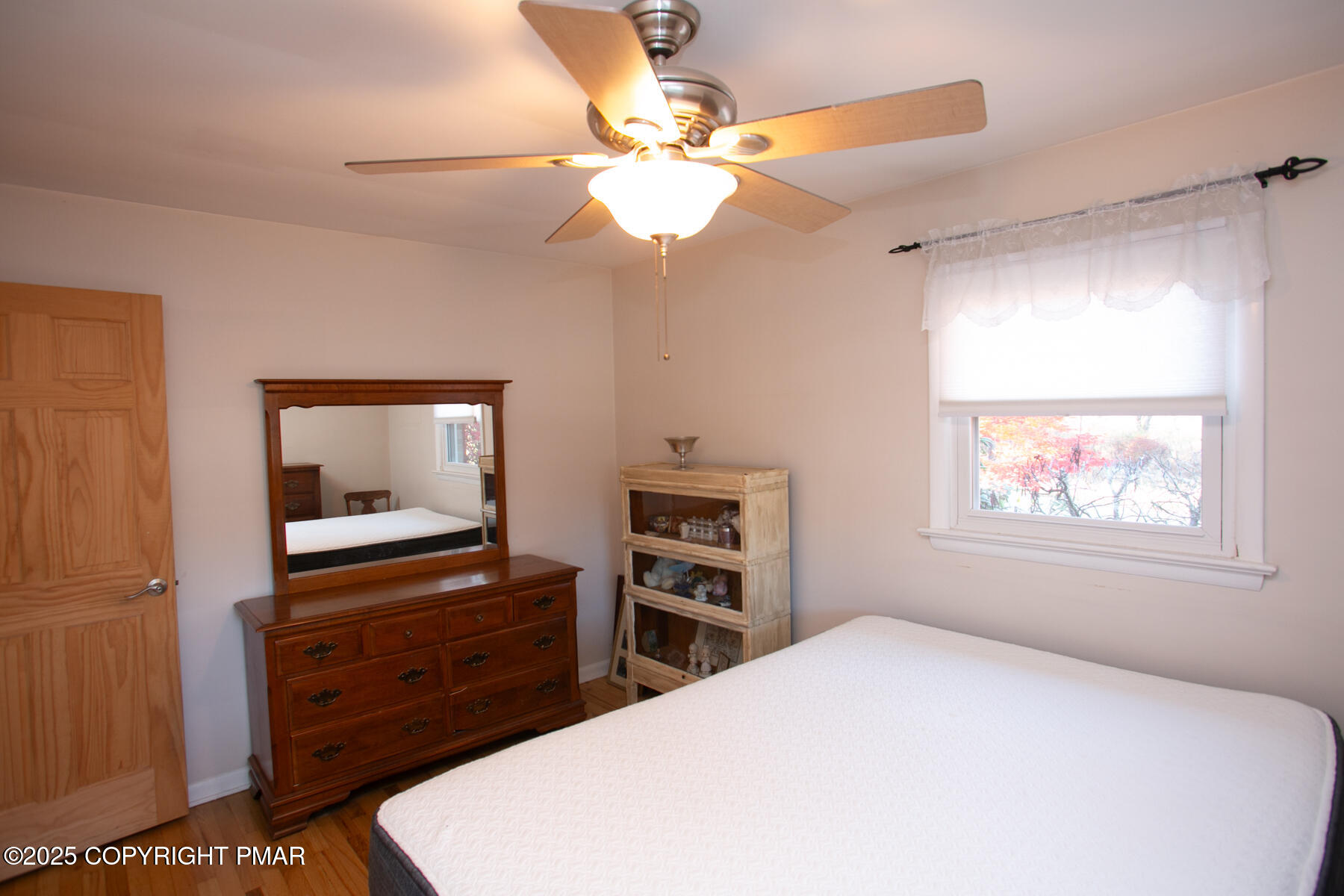 202 Norton Road Stroudsburg, PA 18360 - Photo 23 of 35 a bedroom with a bed and a flat screen tv