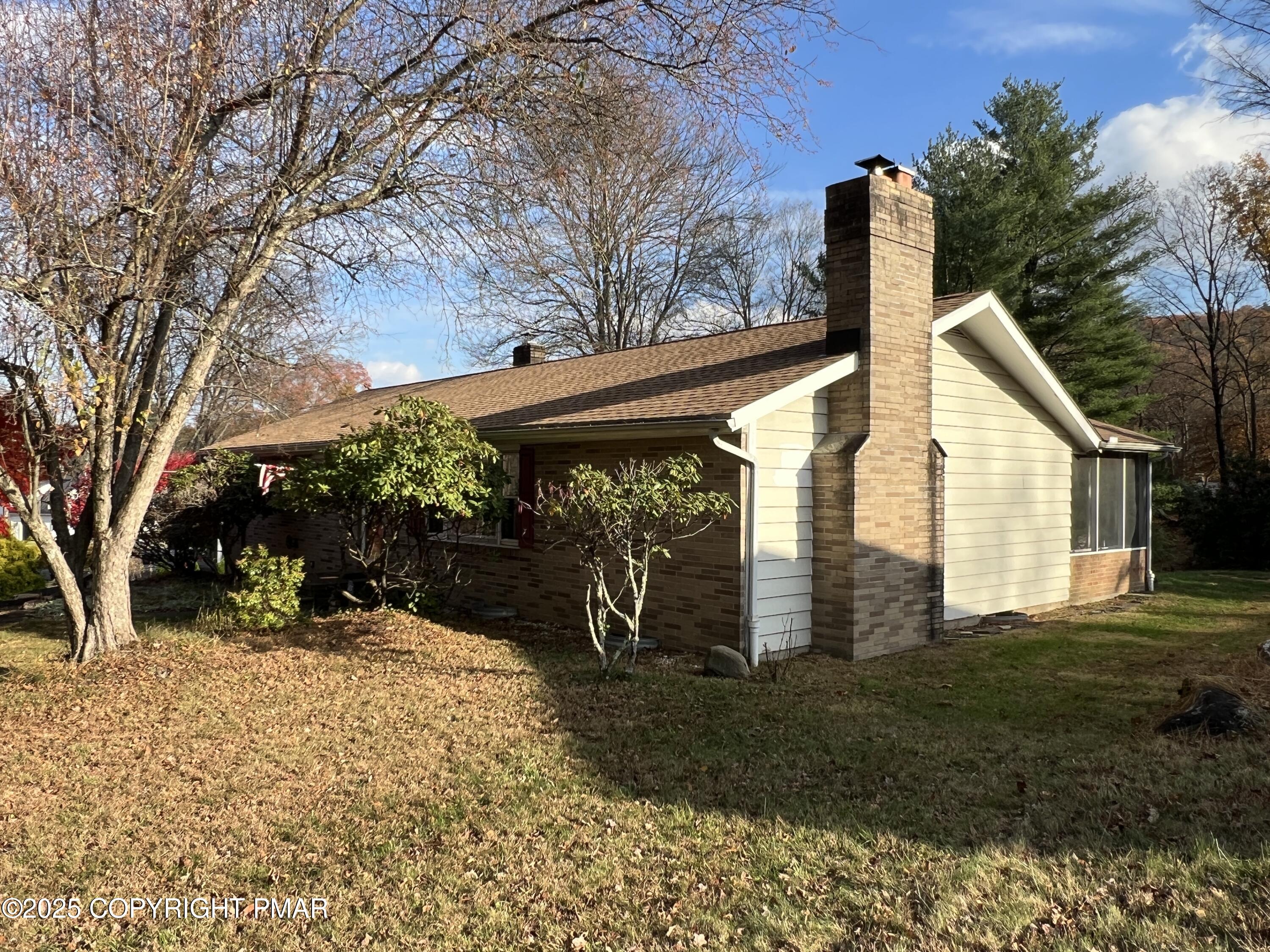 202 Norton Road Stroudsburg, PA 18360 - Photo 9 of 35 a view of a house with a yard