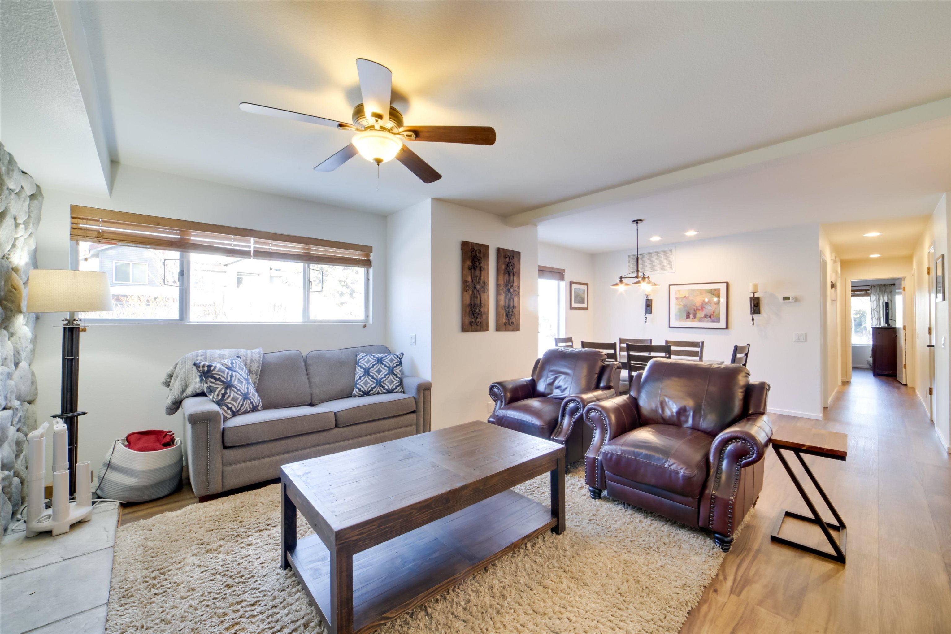 591 Golden Creek Road, Unit 591 Mammoth Lakes, CA 93546 - Photo 2 of 19 a living room with furniture and a chandelier
