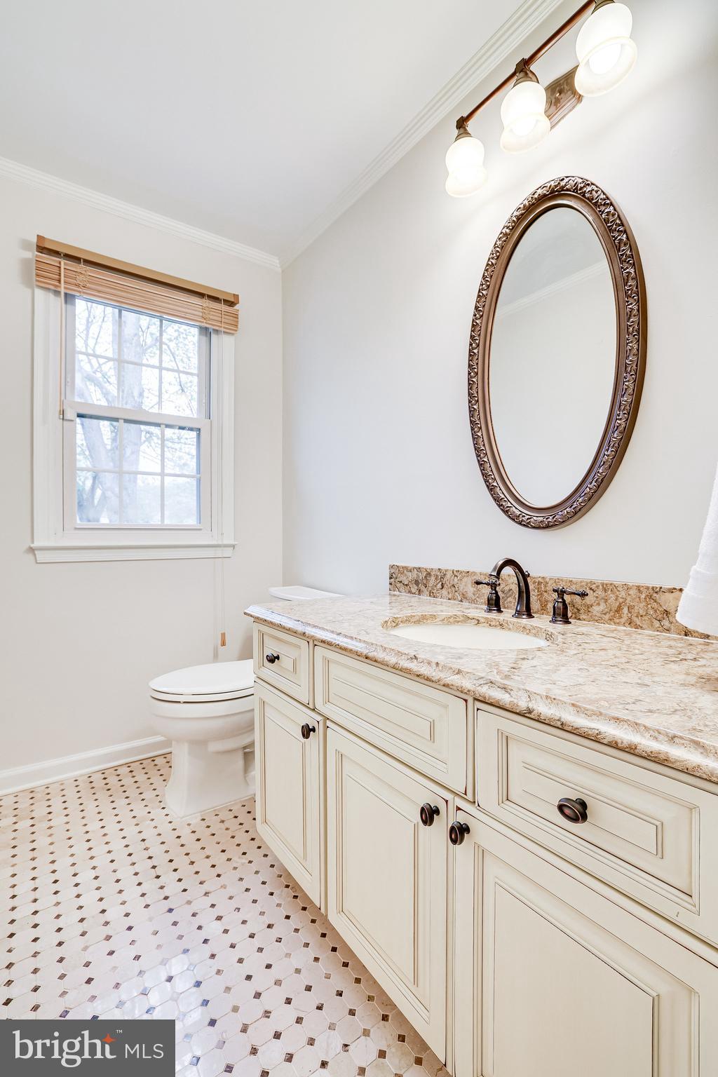 138 Peyton Road Sterling, VA 20165 - Photo 23 of 64 Main Level Updated Half Bathroom