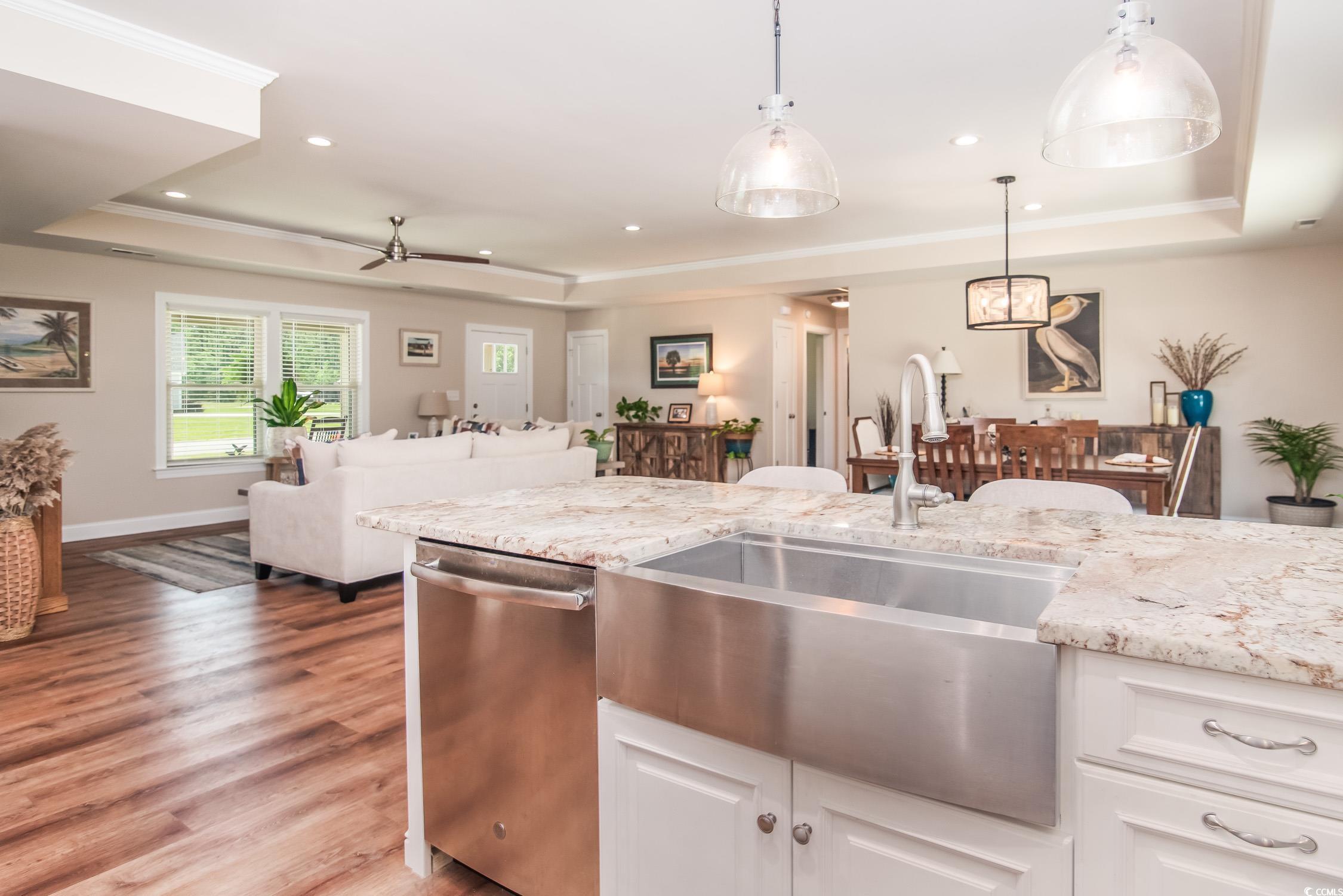 193 Field Loop Road Georgetown, SC 29440 - Photo 12 of 40 Kitchen with a raised ceiling, dishwasher, a sink,