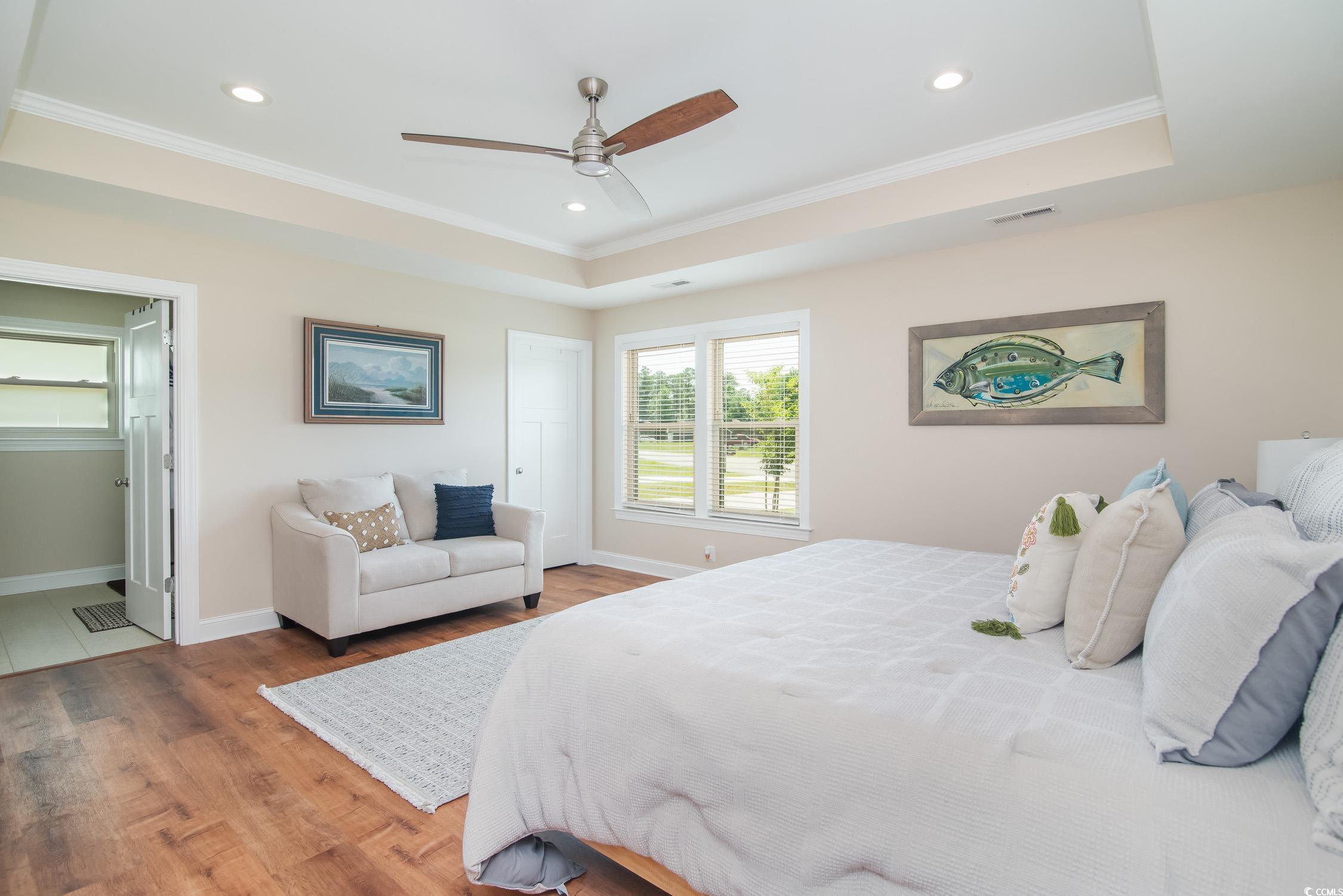 193 Field Loop Road Georgetown, SC 29440 - Photo 17 of 40 Bedroom featuring wood finished floors, ornamental