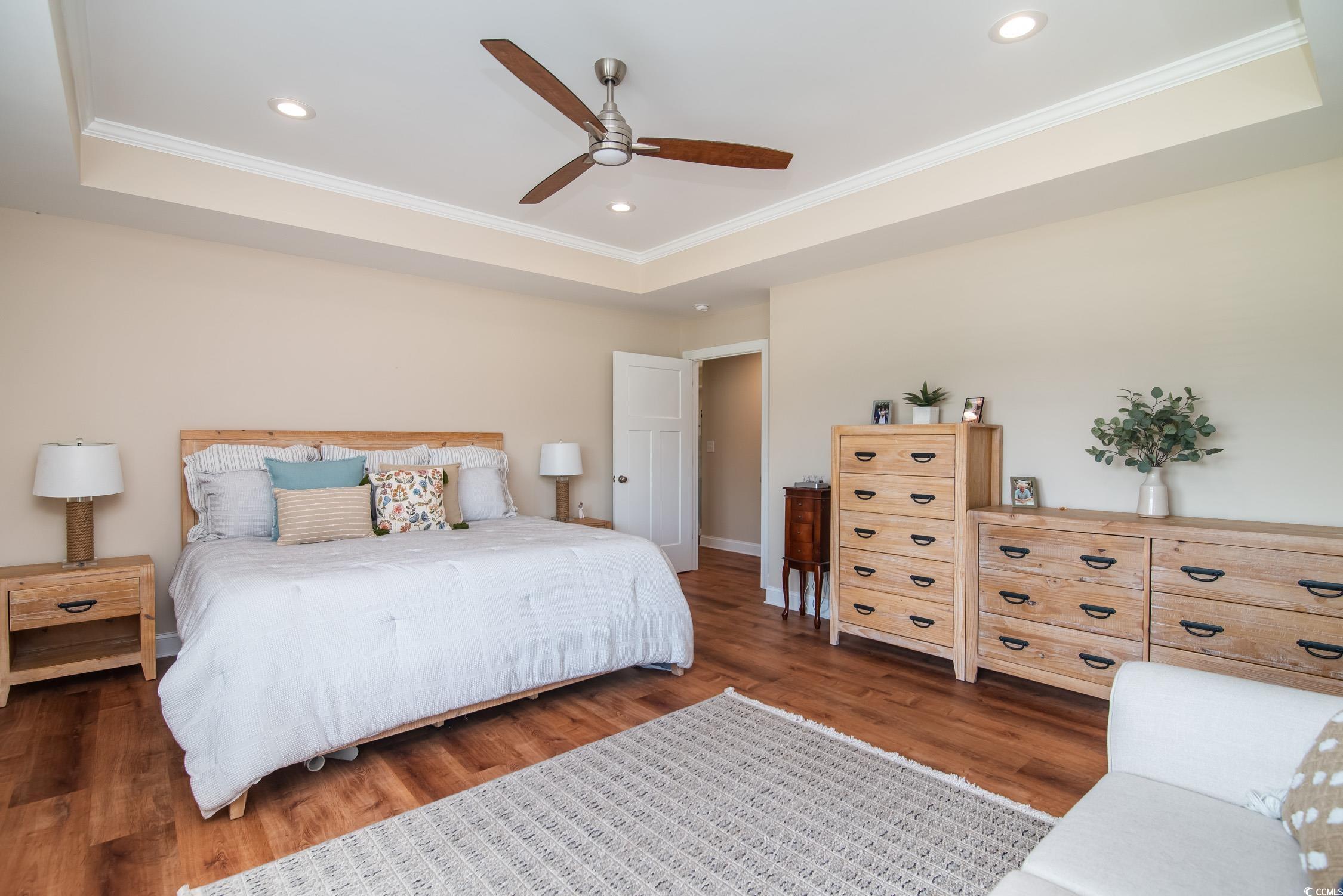 193 Field Loop Road Georgetown, SC 29440 - Photo 19 of 40 Bedroom featuring a raised ceiling, ornamental mol