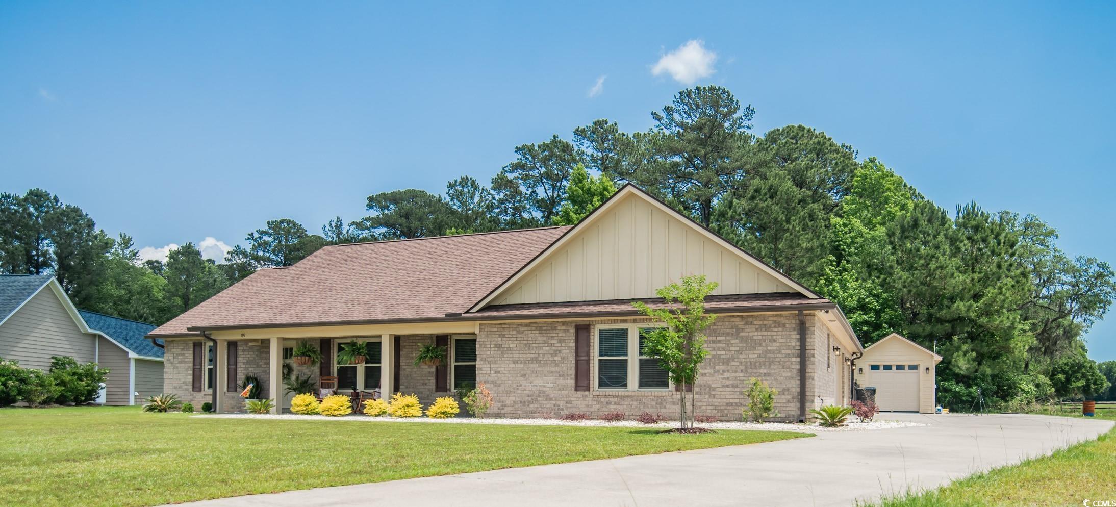 193 Field Loop Road Georgetown, SC 29440 - Photo 2 of 40 Ranch-style home featuring a front yard, brick sid