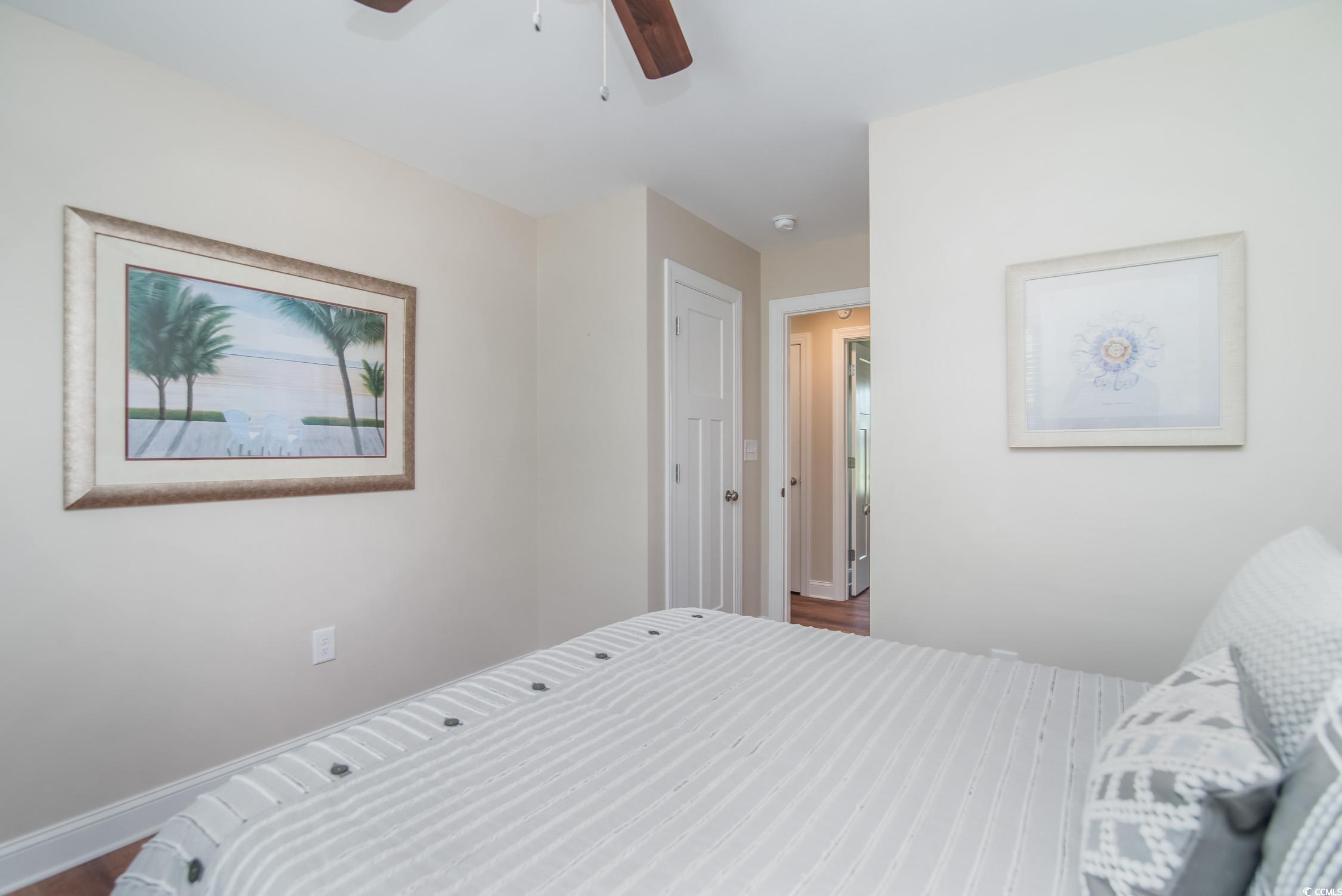 193 Field Loop Road Georgetown, SC 29440 - Photo 23 of 40 Bedroom featuring baseboards, a ceiling fan, and w