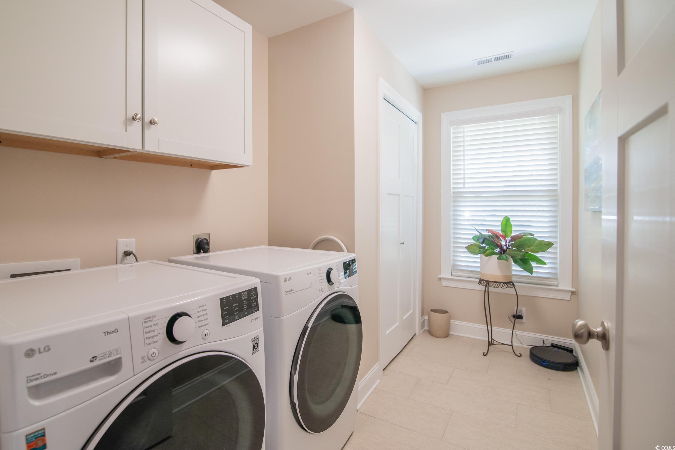 193 Field Loop Road Georgetown, SC 29440 - Photo 25 of 40 Laundry room featuring cabinet space, baseboards,