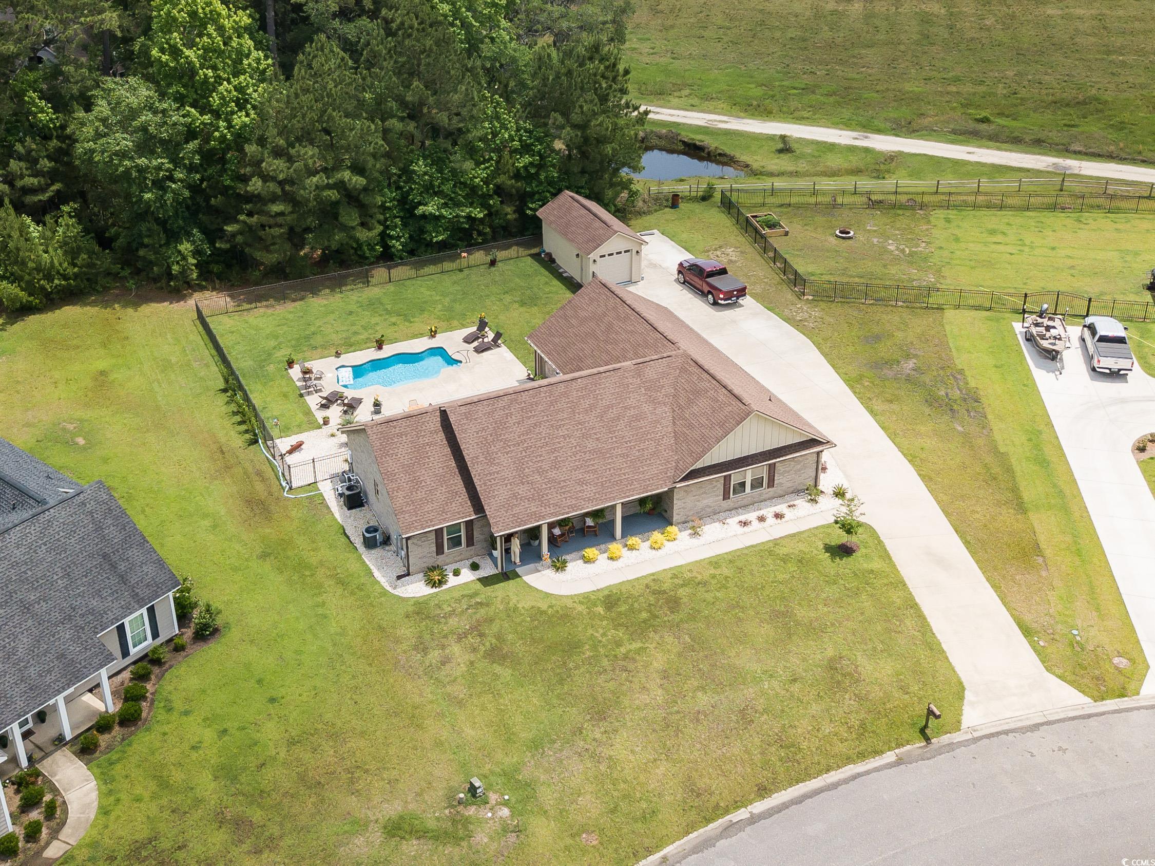 193 Field Loop Road Georgetown, SC 29440 - Photo 31 of 40 View of subject property with a pool