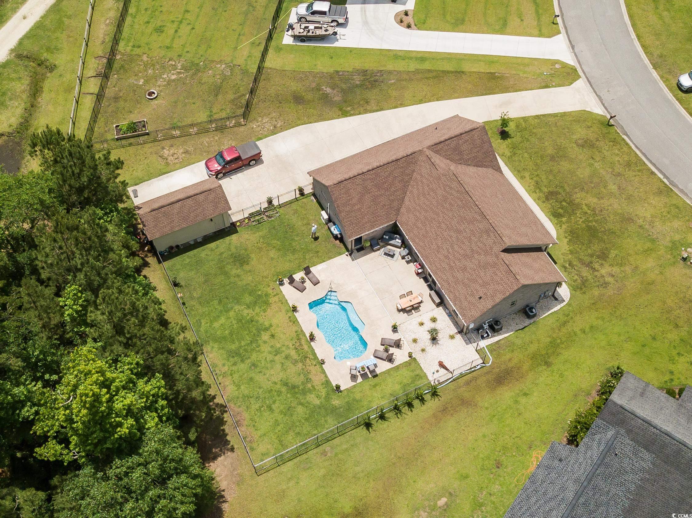 193 Field Loop Road Georgetown, SC 29440 - Photo 38 of 40 View from above of property with a pool