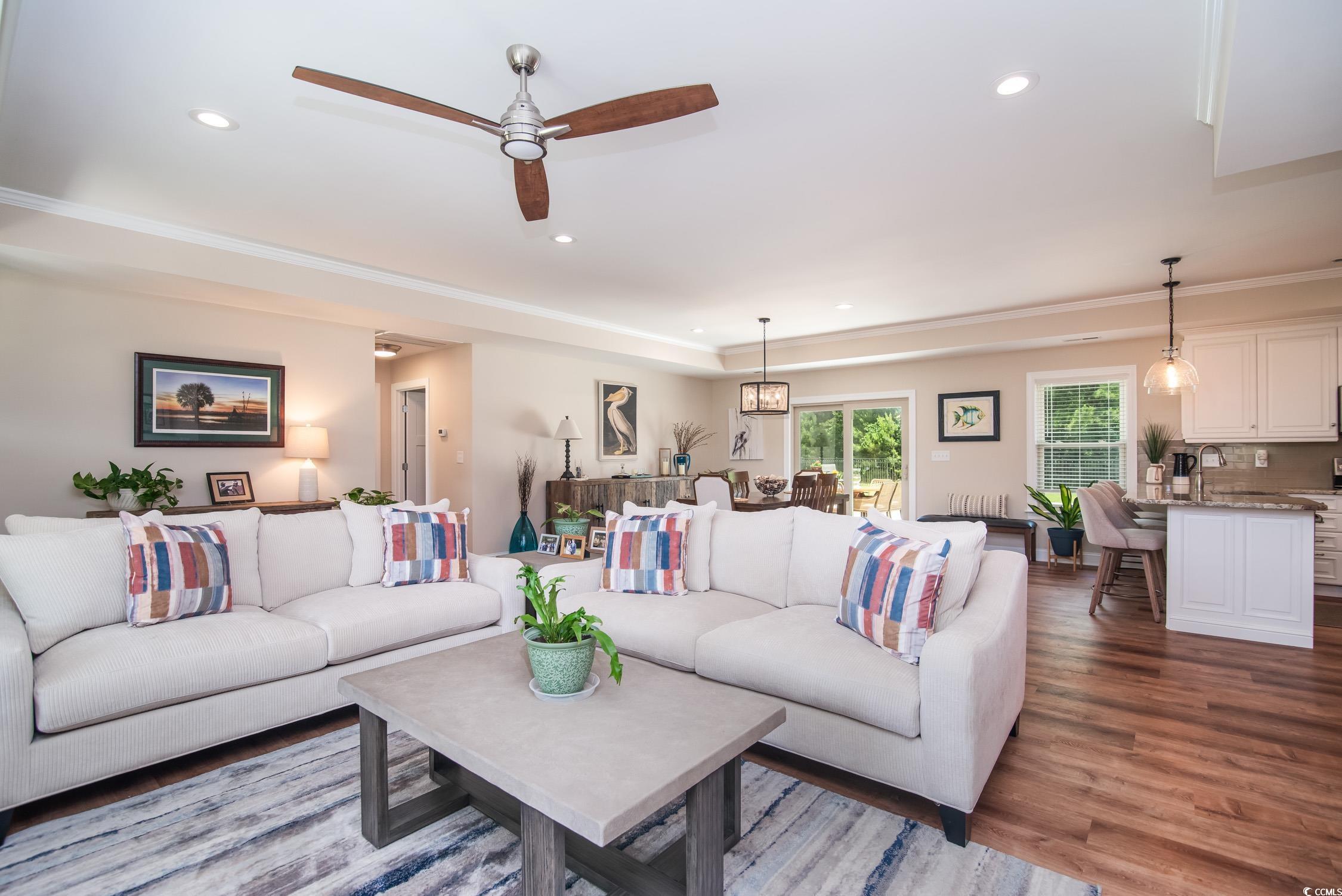 193 Field Loop Road Georgetown, SC 29440 - Photo 8 of 40 Living area featuring wood finished floors, recess