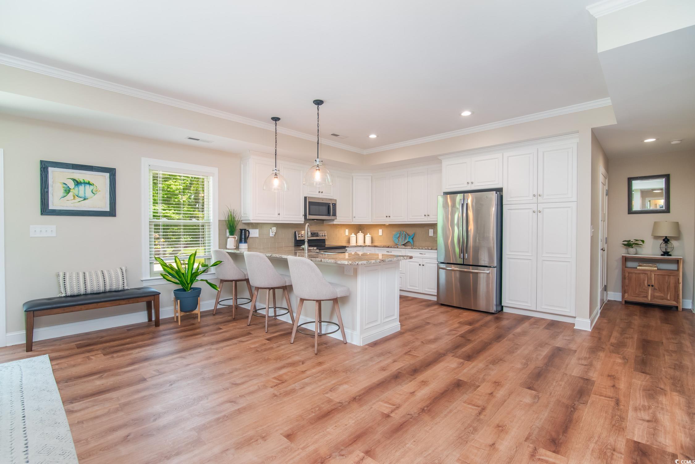 193 Field Loop Road Georgetown, SC 29440 - Photo 9 of 40 Kitchen with appliances with stainless steel finis
